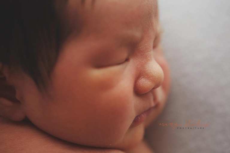 8 days old baby boy milia on nose newborn portraits in singapore studio