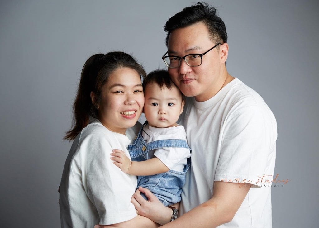 1 year old baby with parents family portraits in singapore studio