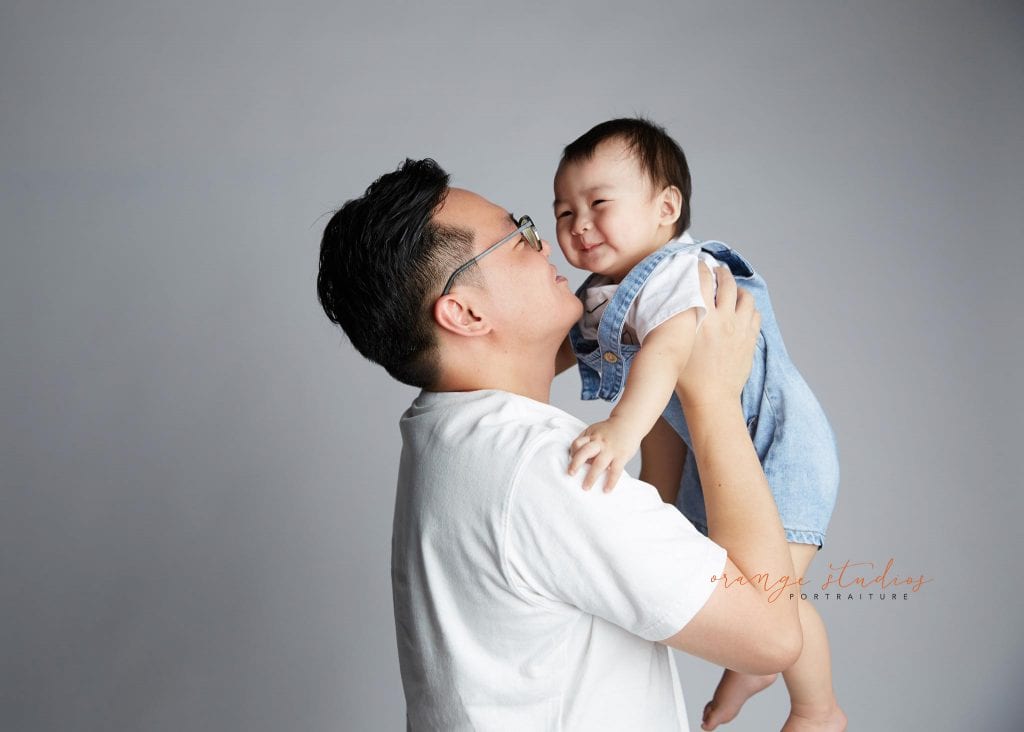 1 year old baby with dad family portraits in singapore studio
