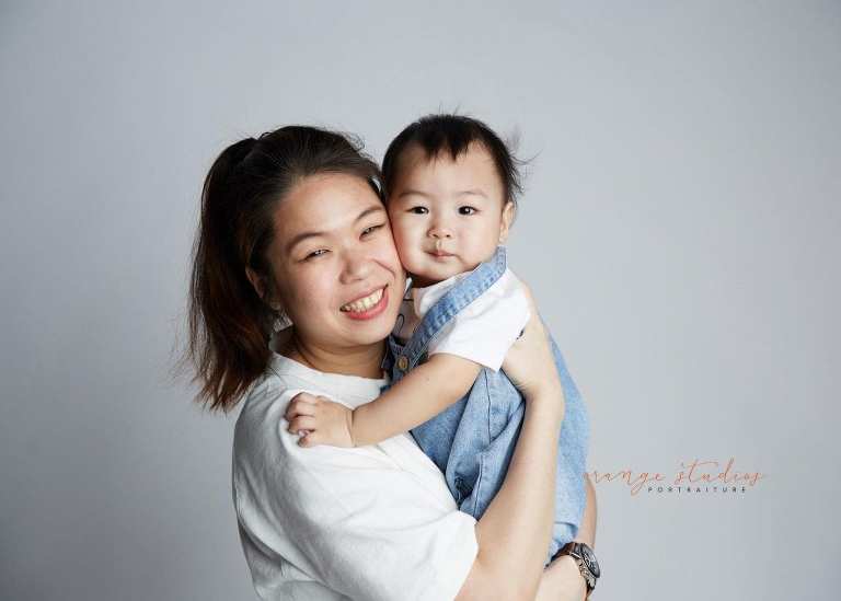1 year old baby with mum family portraits in singapore studio