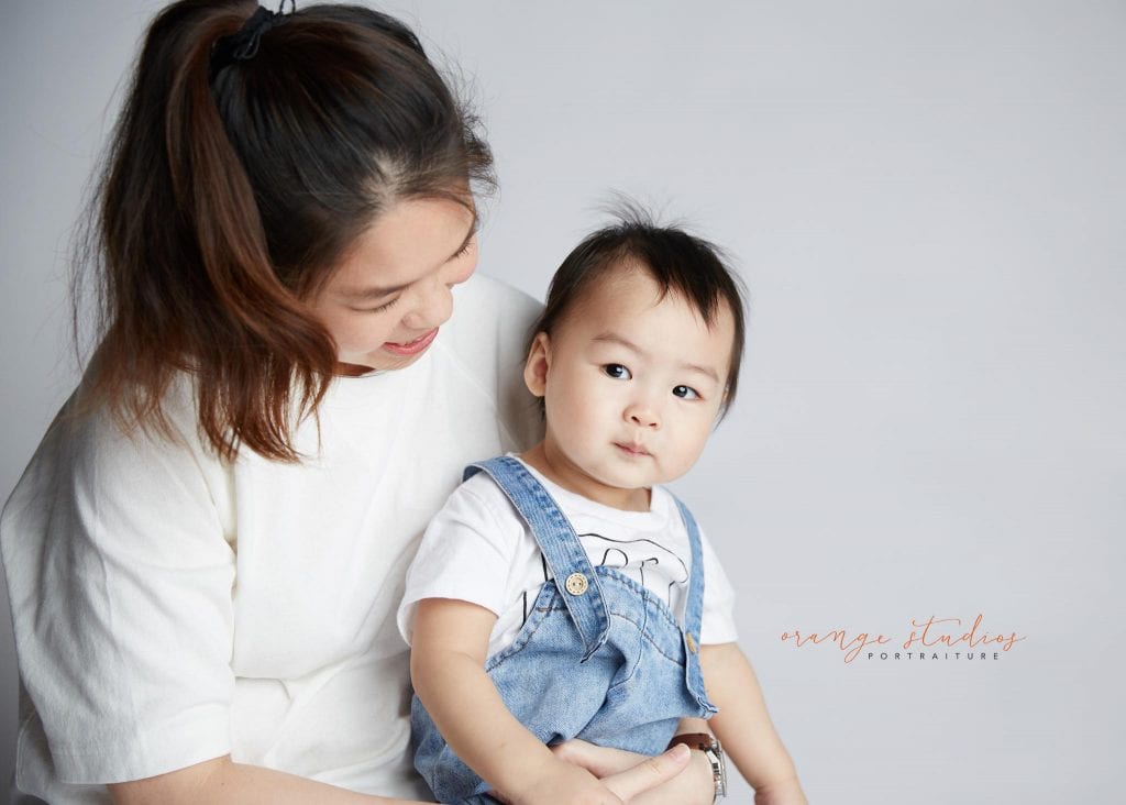 1 year old baby with mum family portraits in singapore studio
