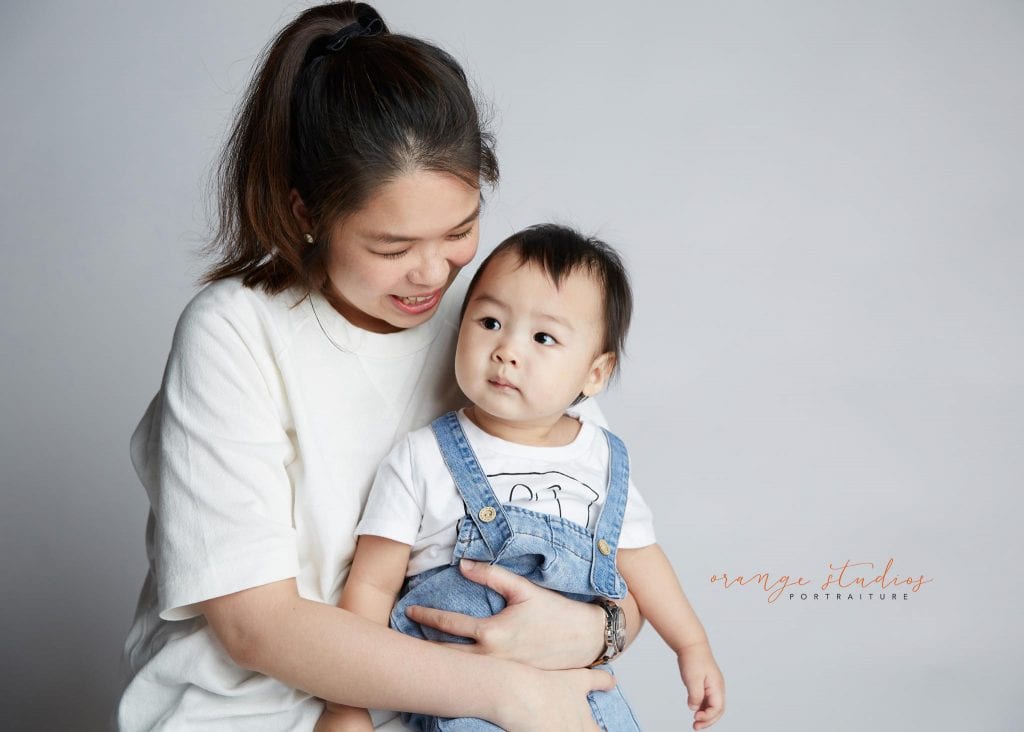 1 year old baby with mum family portraits in singapore studio