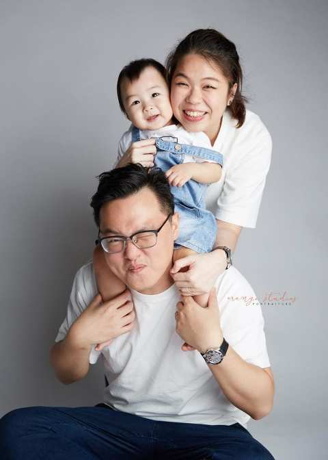 1 year old baby with parents family portraits in singapore studio