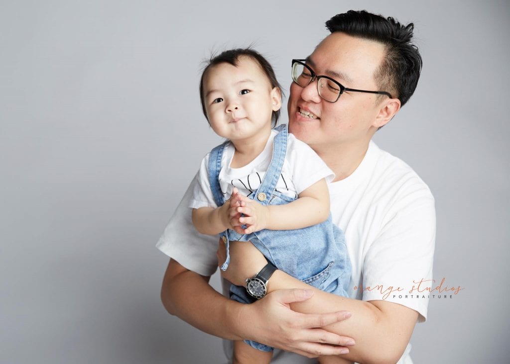 1 year old baby with dad family portraits in singapore studio