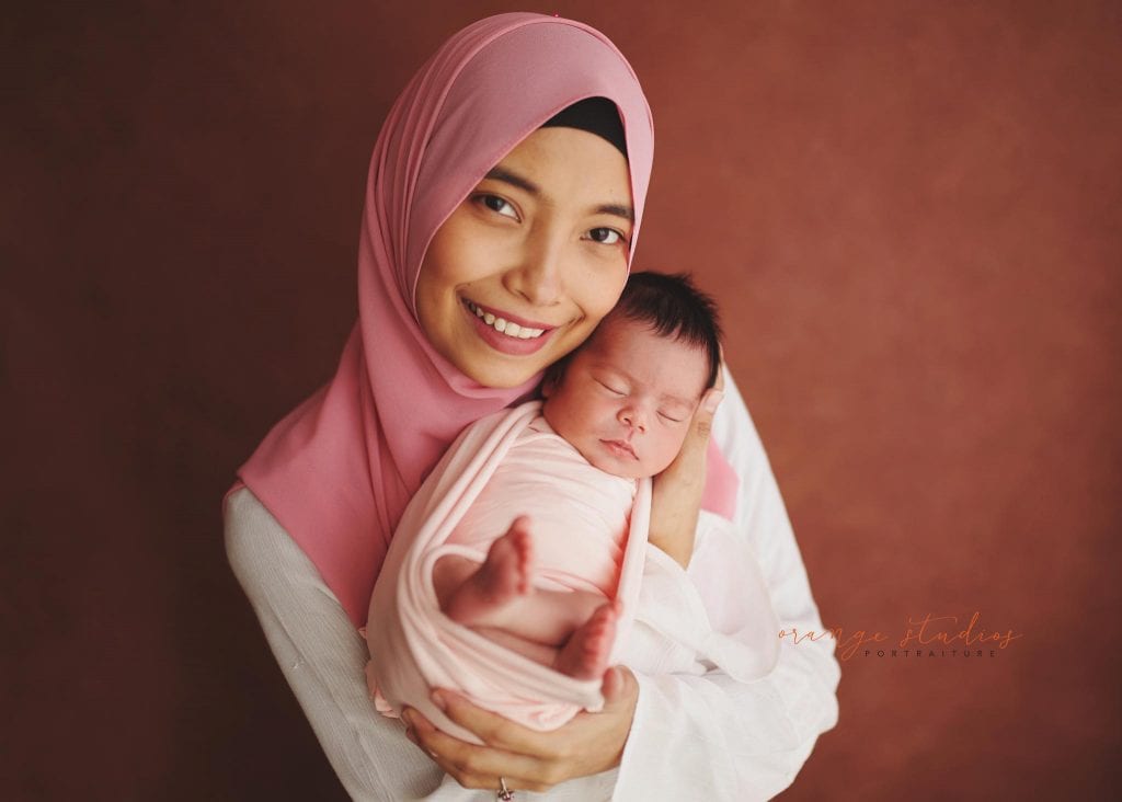 7 days old baby girl newborn portraits with mum in singapore studio