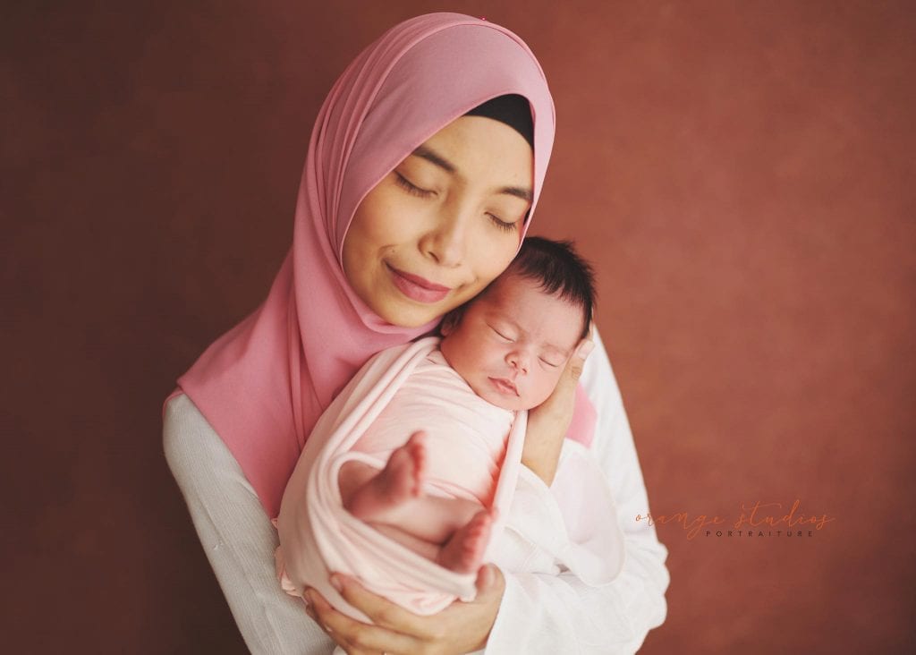 7 days old baby girl newborn portraits with mum in singapore studio