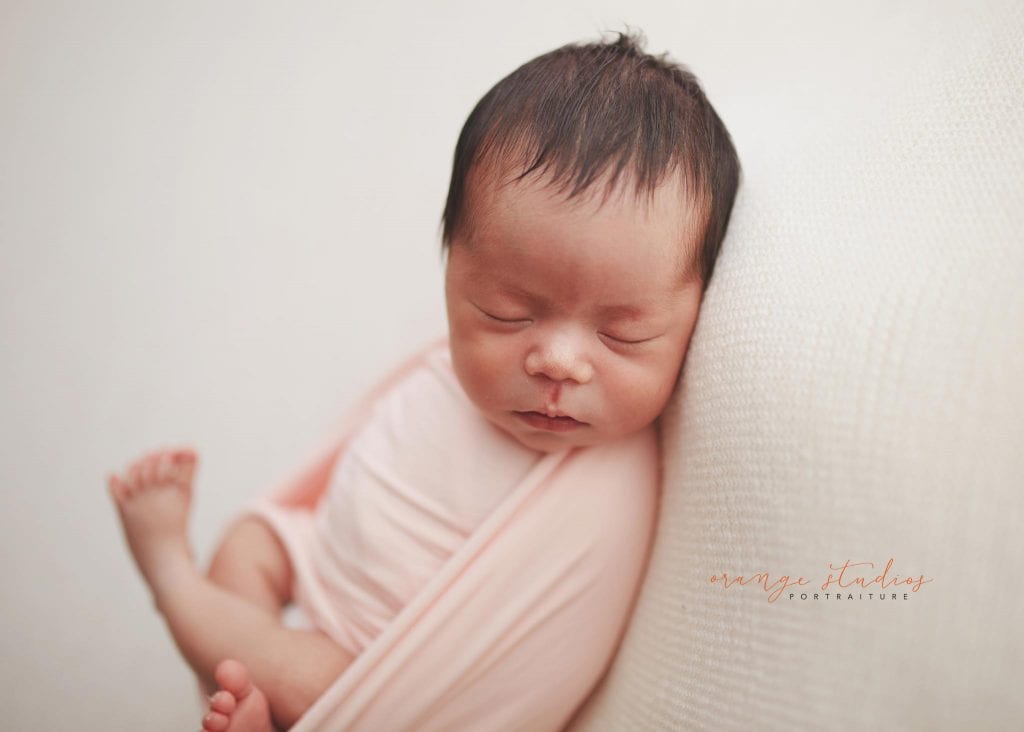7 days old baby girl newborn portraits in singapore studio