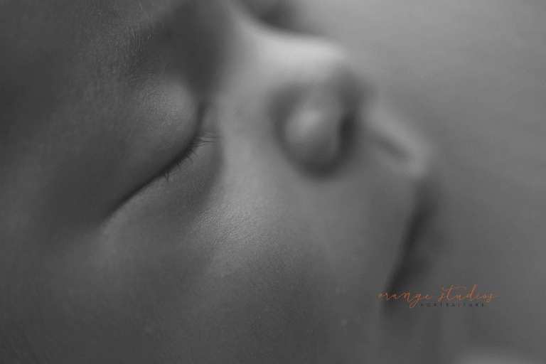 7 days old baby girl close-up black and white newborn portraits in singapore studio