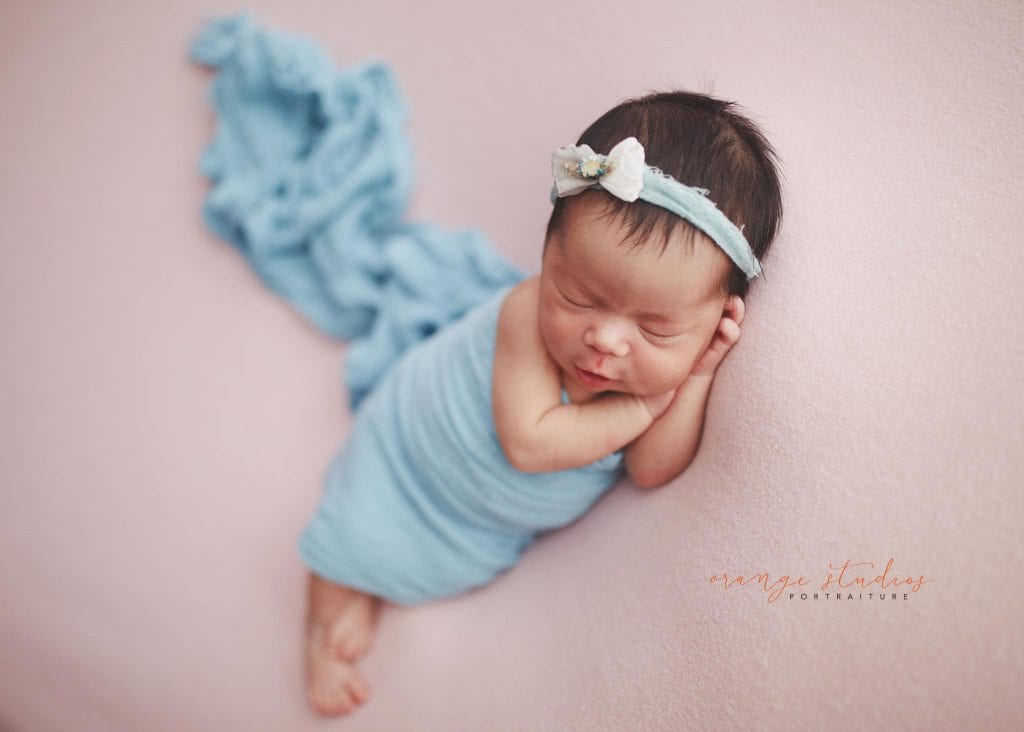 7 days old baby girl newborn portraits in singapore studio