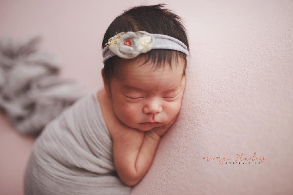 7 days old baby girl newborn portraits in singapore studio