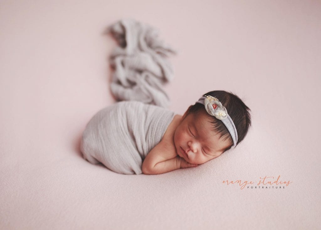 7 days old baby girl newborn portraits in singapore studio