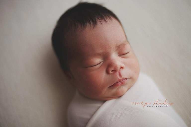 7 days old baby girl newborn portraits in singapore studio
