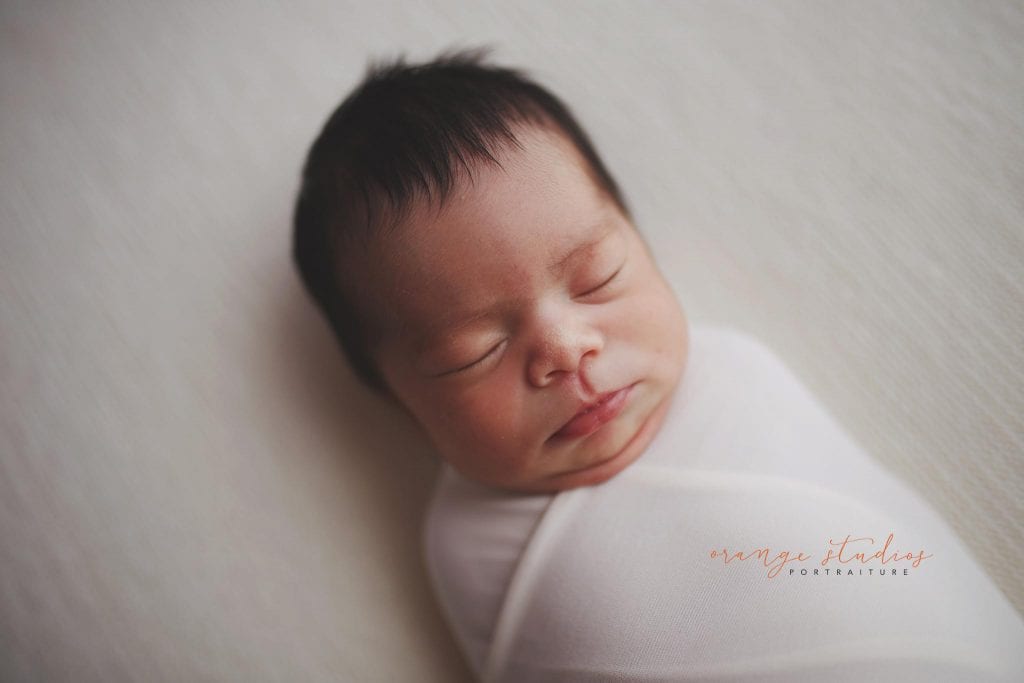 7 days old baby girl newborn portraits in singapore studio