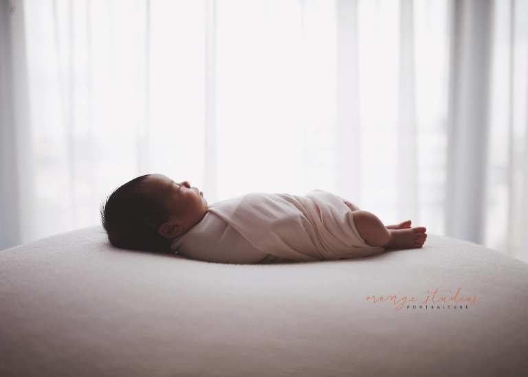 7 days old baby girl newborn portraits in singapore studio