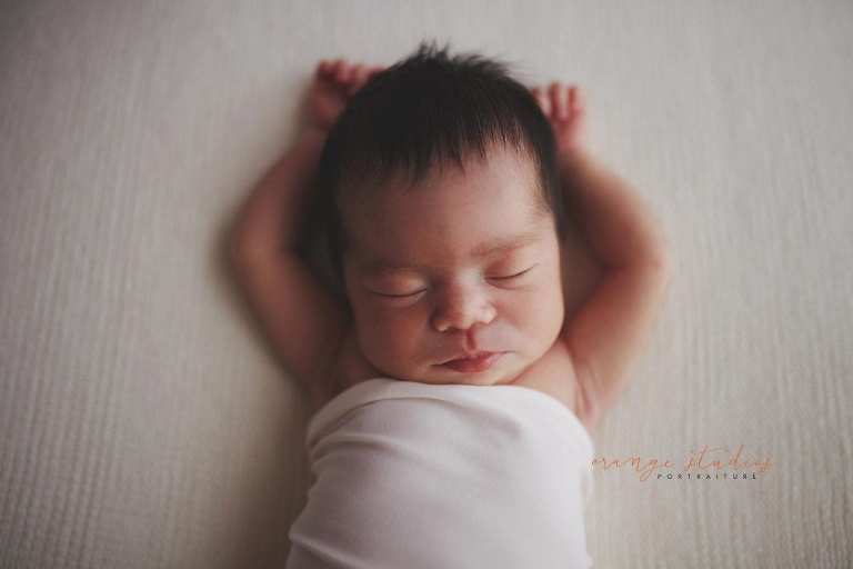 7 days old baby girl newborn portraits in singapore studio