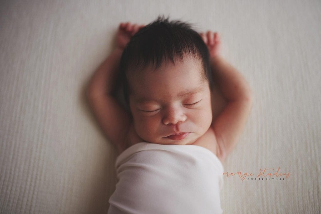 7 days old baby girl newborn portraits in singapore studio