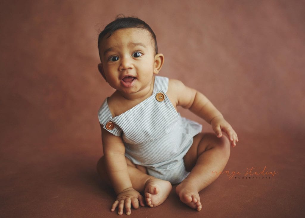 adorable 6 months old baby portraits in singapore natural light studio