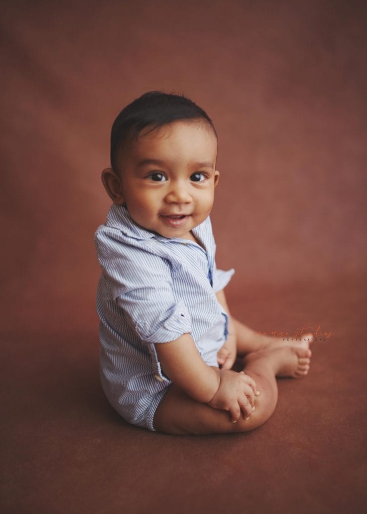 smiling 6 months old baby portraits in singapore natural light studio