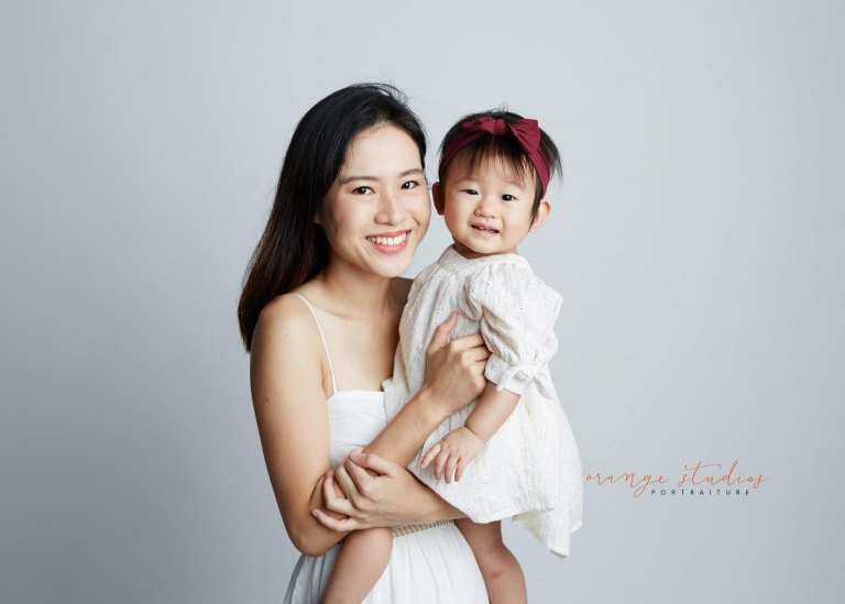 1 year old baby girl with mum family portraits in singapore studio