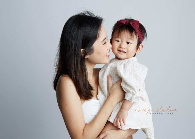 1 year old baby girl with mum family portraits in singapore studio