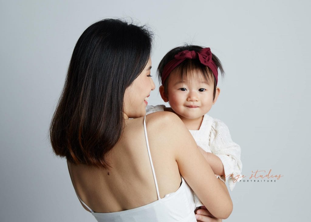 1 year old baby girl with mum family portraits in singapore studio