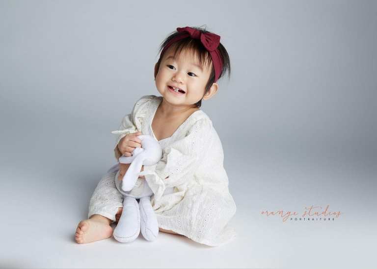 adorable 1 year old baby girl portraits in singapore studio