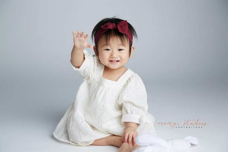 adorable 1 year old baby girl portraits in singapore studio