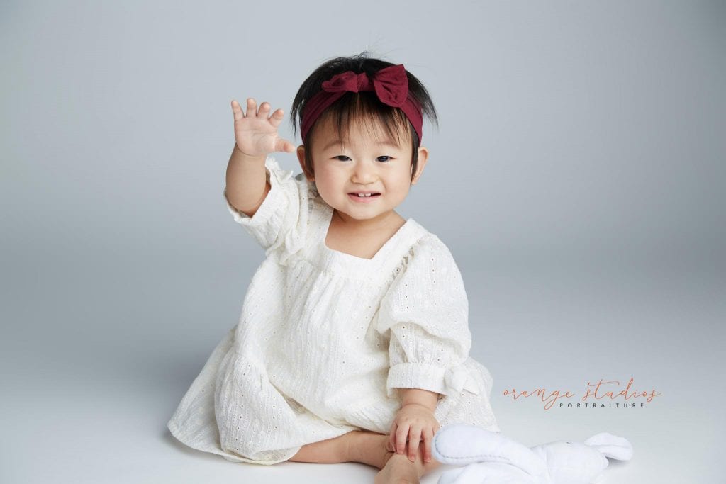 adorable 1 year old baby girl portraits in singapore studio