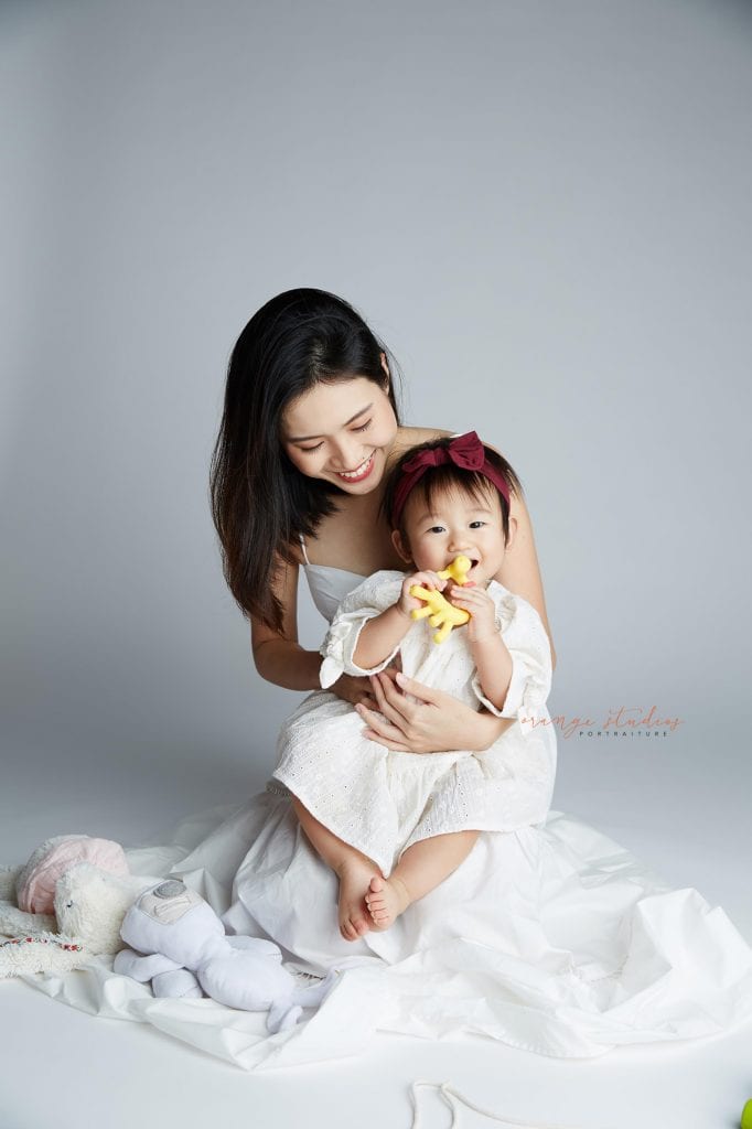 1 year old baby girl with mum family portraits in singapore studio