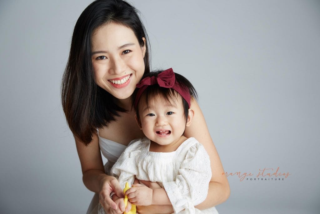 1 year old baby girl with mum family portraits in singapore studio