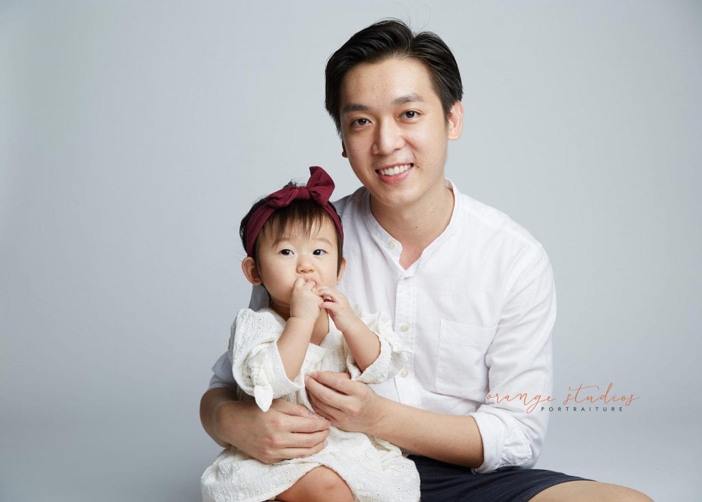 1 year old baby girl with dad family portraits in singapore studio