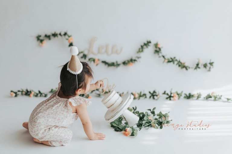 1 year old baby girl floral theme cake smash in singapore studio
