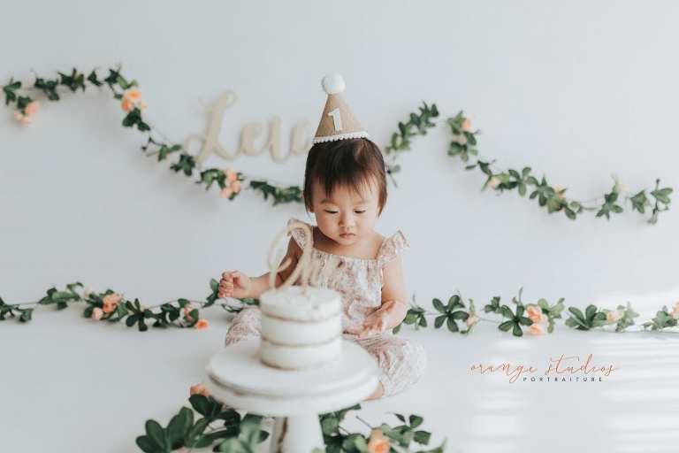 1 year old baby girl floral theme cake smash in singapore studio
