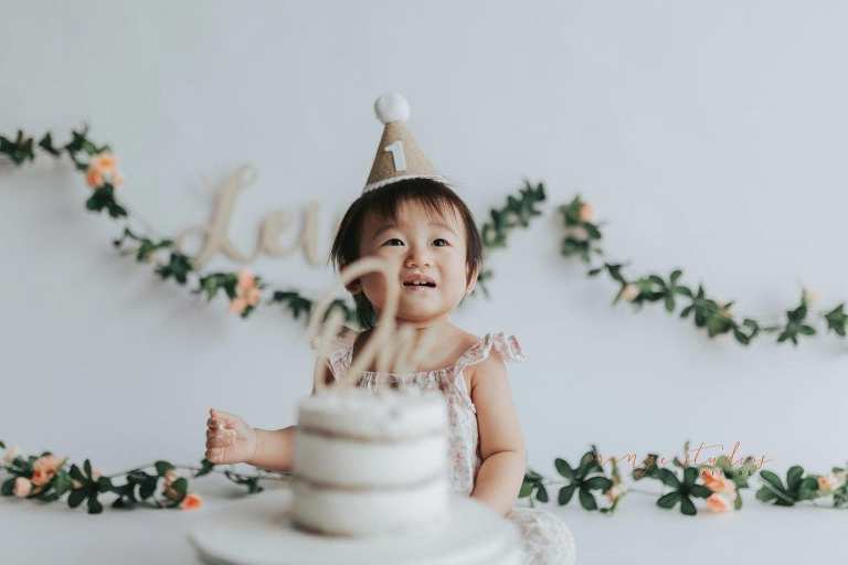 1 year old baby girl floral theme cake smash in singapore studio