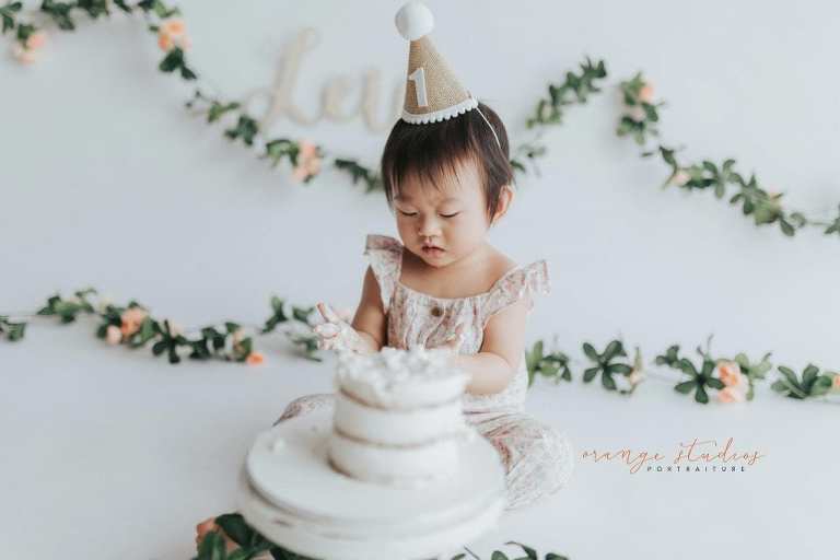 1 year old baby girl floral theme cake smash in singapore studio