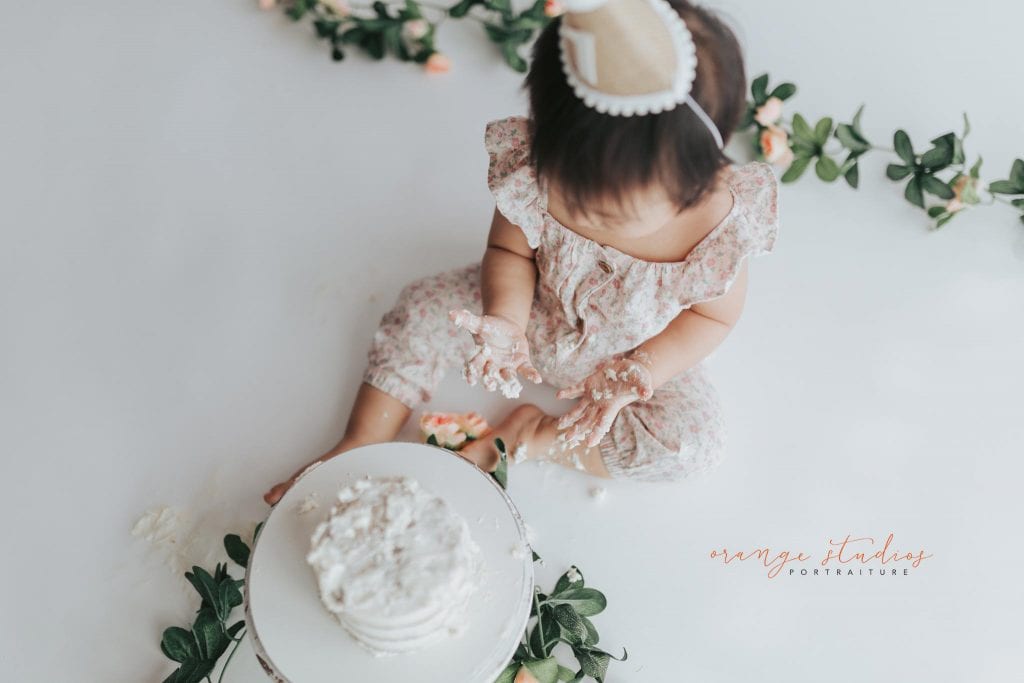 1 year old baby girl floral theme cake smash in singapore studio
