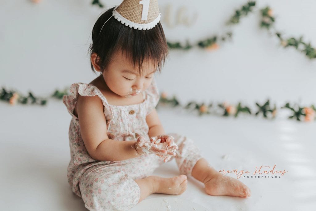 1 year old baby girl floral theme cake smash in singapore studio