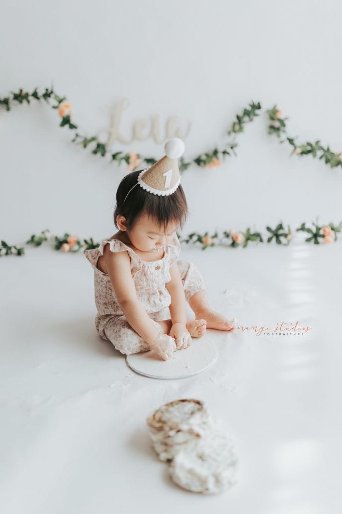 1 year old baby girl floral theme cake smash in singapore studio