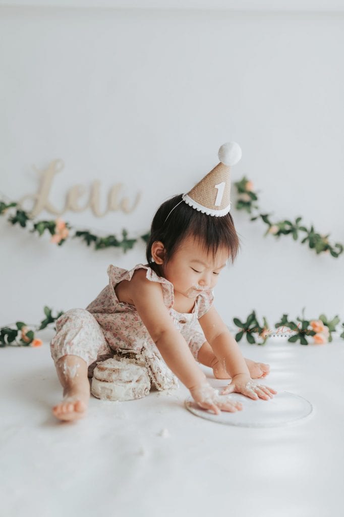 1 year old baby girl floral theme cake smash in singapore studio