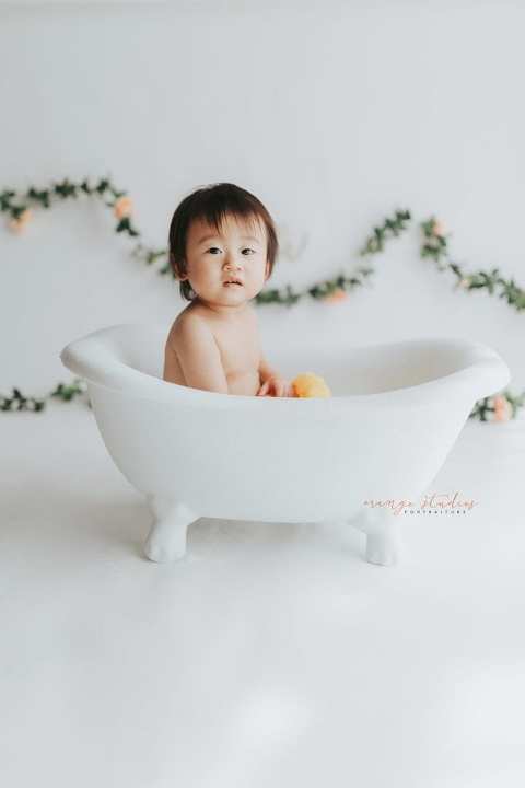 1 year old baby girl bubble bath portraits in singapore studio natural light
