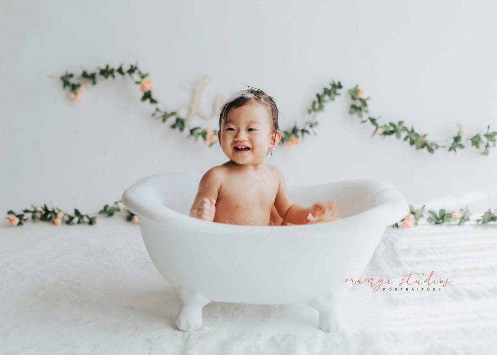 1 year old baby girl bubble bath portraits in singapore studio natural light