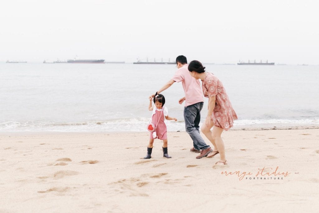 outdoor family portraits at singapore beach