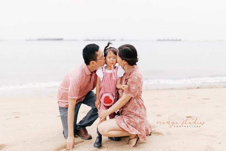 outdoor family portraits at singapore beach
