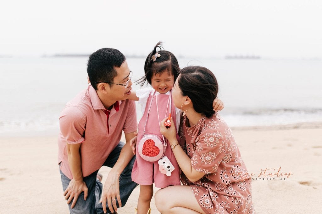 outdoor family portraits at singapore beach