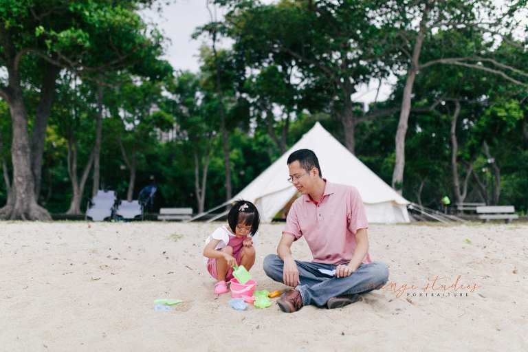 dad and girl outdoor family portraits at singapore beach