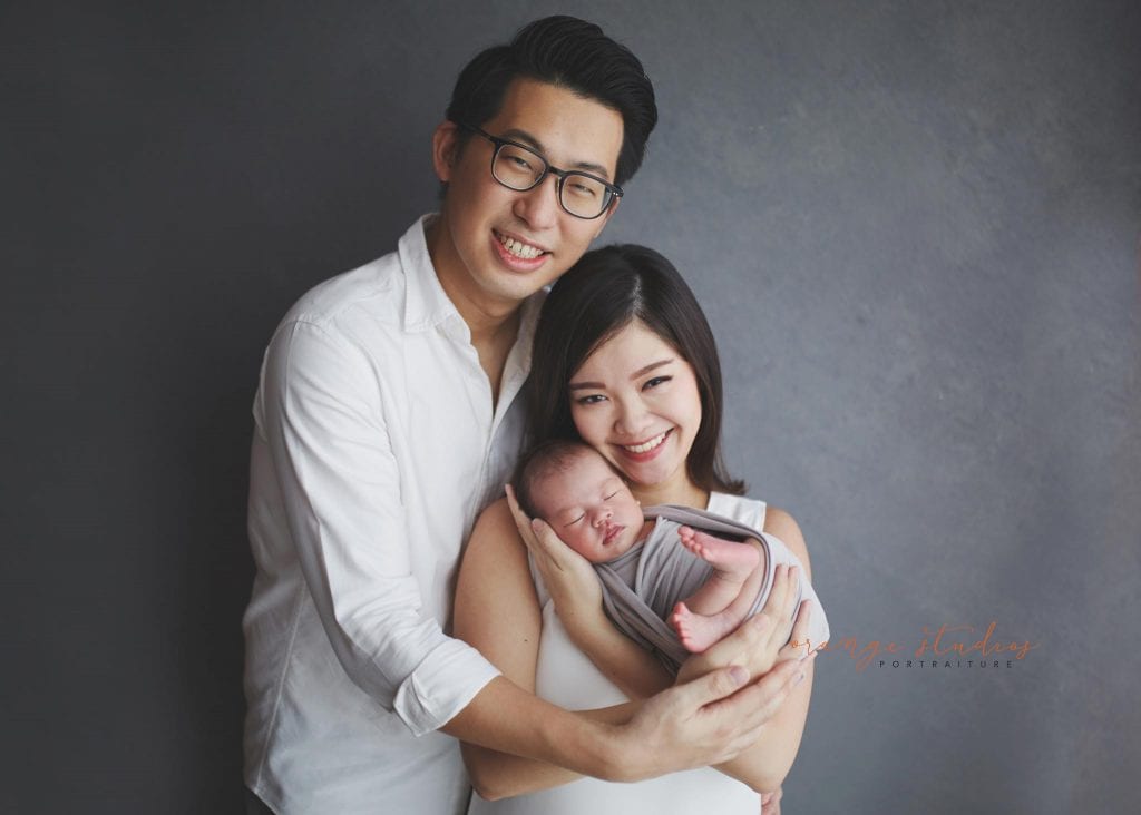 14 days old baby boy with parents newborn portraits in singapore studio