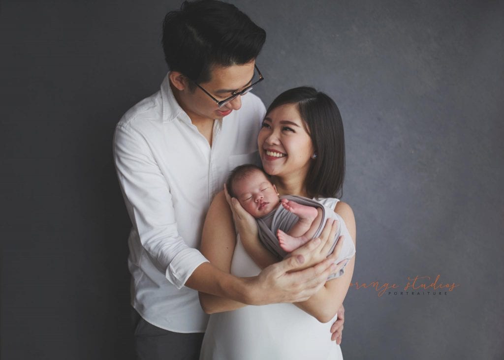 14 days old baby boy with parents newborn portraits in singapore studio