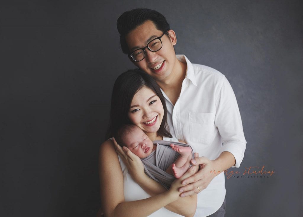 14 days old baby boy with parents newborn portraits in singapore studio