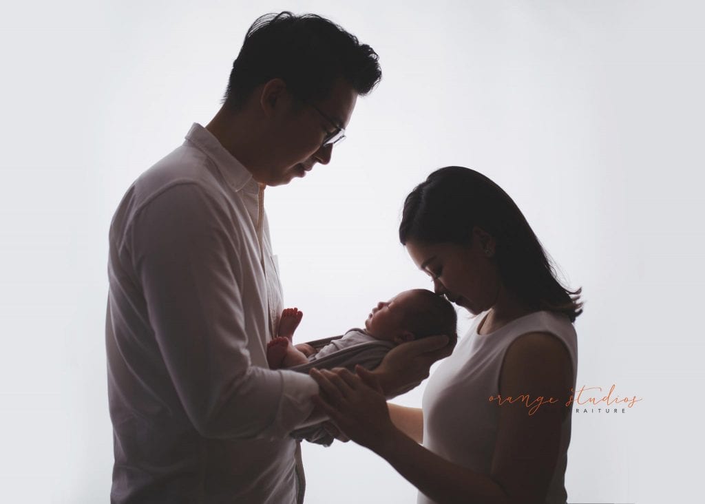 14 days old baby boy with parents newborn portraits in singapore studio