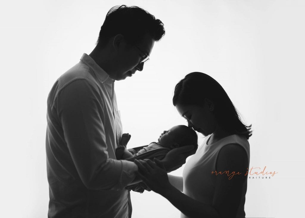 14 days old baby boy with parents newborn portraits in singapore studio